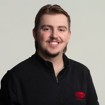 Portrait of Ethan Tchir, Associate.